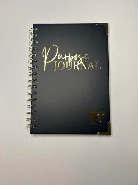Midnight Black front hardcover with a smooth finish features the word "Purpose Journal" stamped in gold.